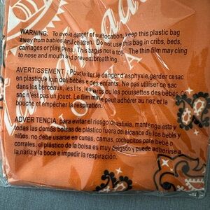 Tito’s Orange Paisley Print Dog Bandana